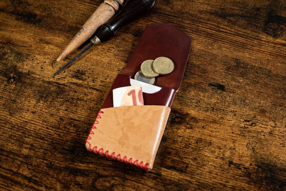 CARTERA GRANATE Y TOSTADO POKET AXEL ROGERS